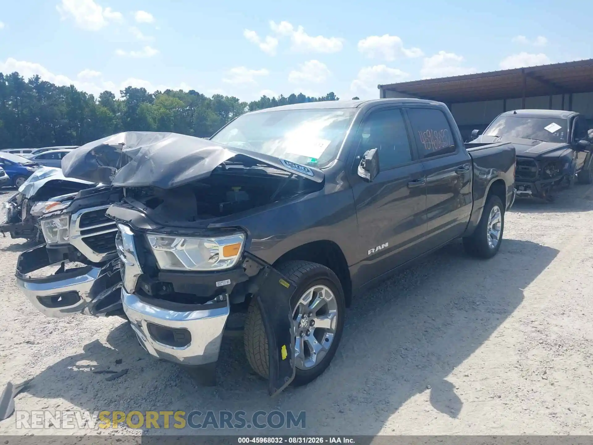 2 Photograph of a damaged car 1C6RRFFGXNN402307 RAM 1500 2022