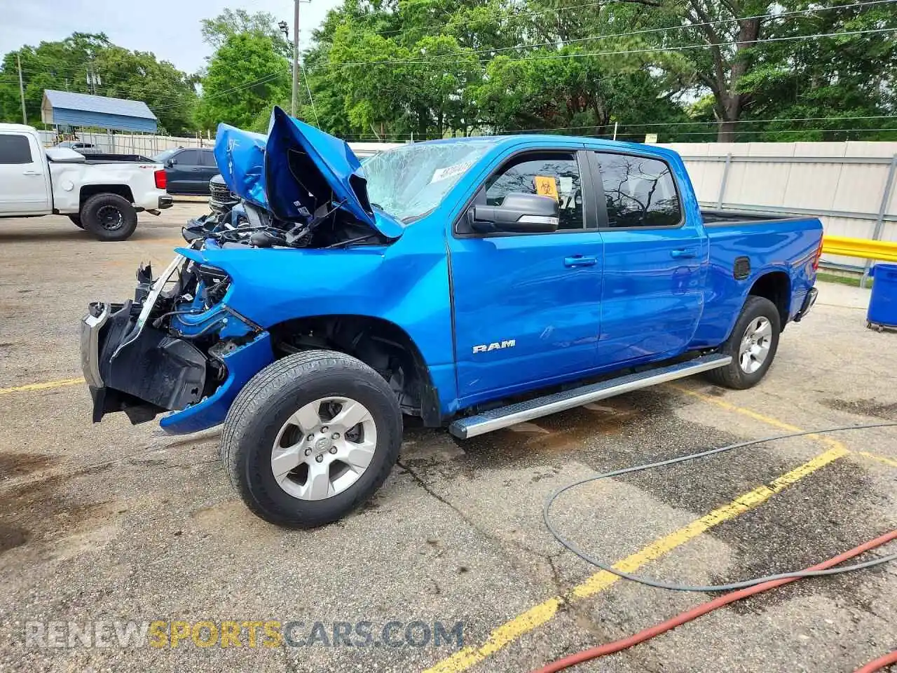 1 Photograph of a damaged car 1C6RRFMG6NN370331 RAM 1500 2022