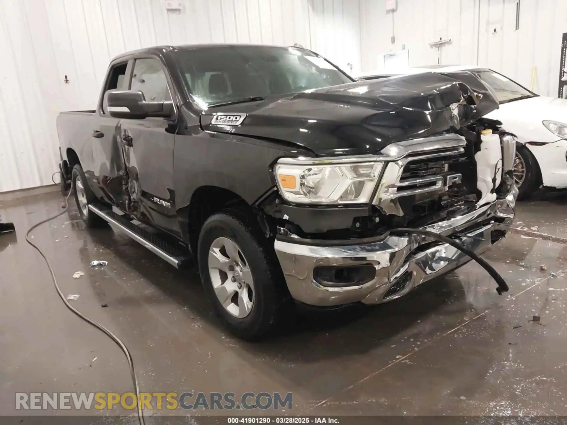 1 Photograph of a damaged car 1C6SRFBT1NN118715 RAM 1500 2022