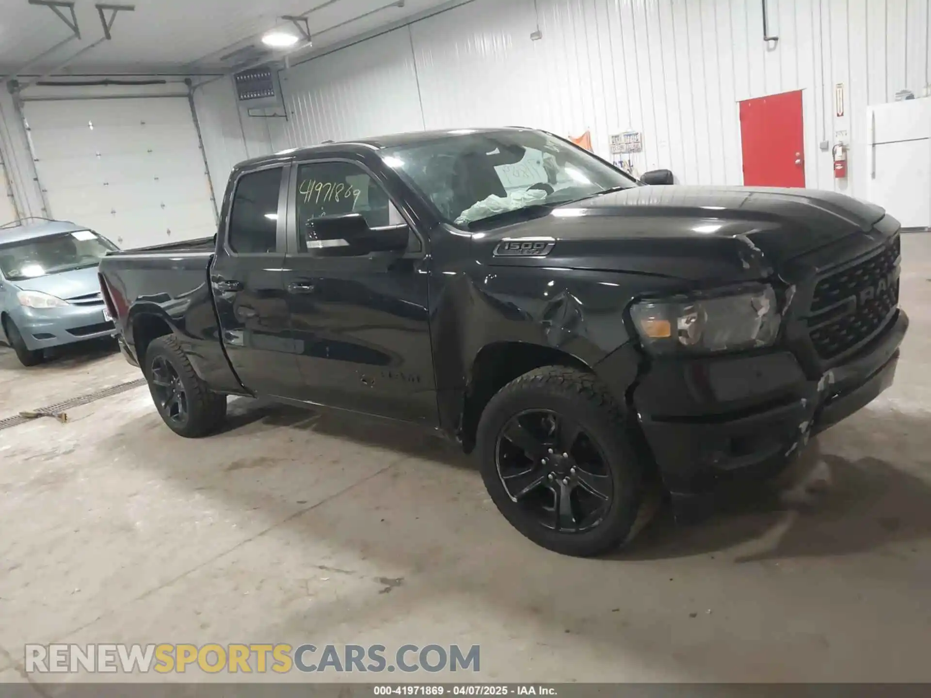 1 Photograph of a damaged car 1C6SRFBT2NN281888 RAM 1500 2022