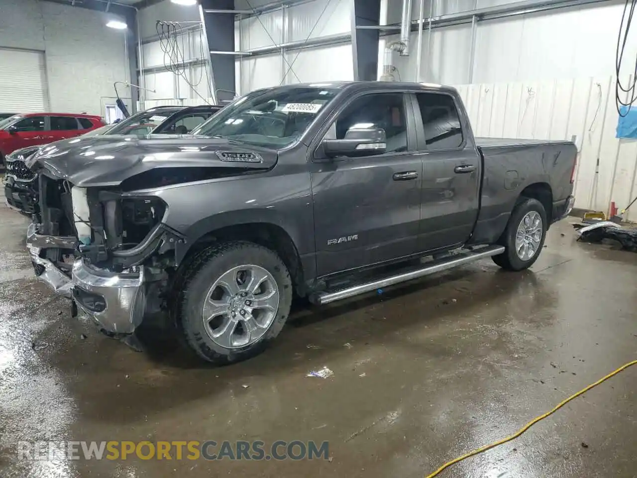 1 Photograph of a damaged car 1C6SRFBT4NN155323 RAM 1500 2022