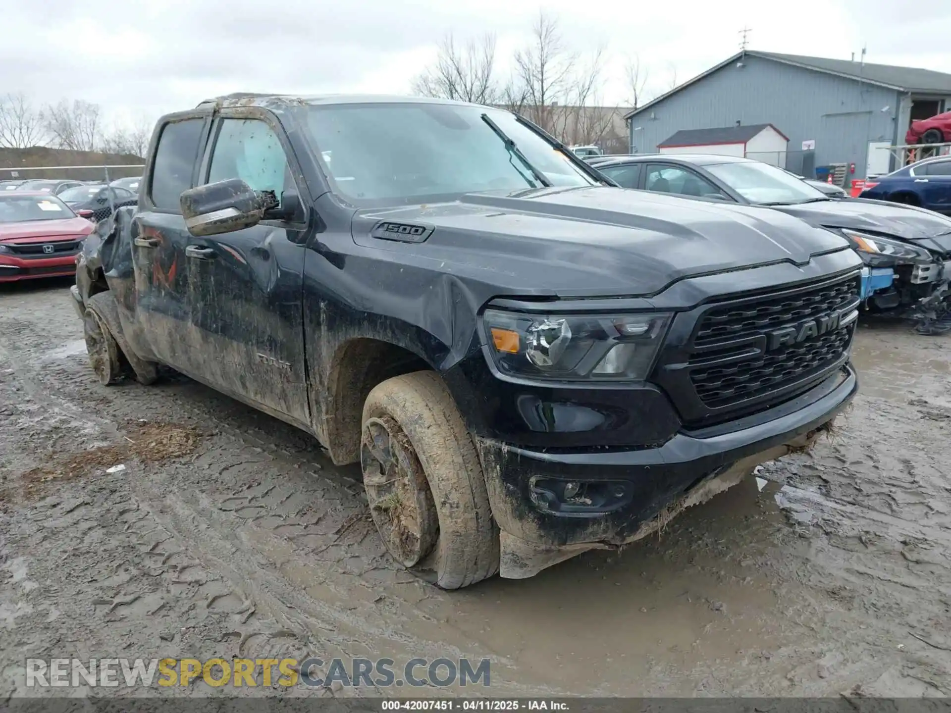 1 Photograph of a damaged car 1C6SRFBT5NN138689 RAM 1500 2022