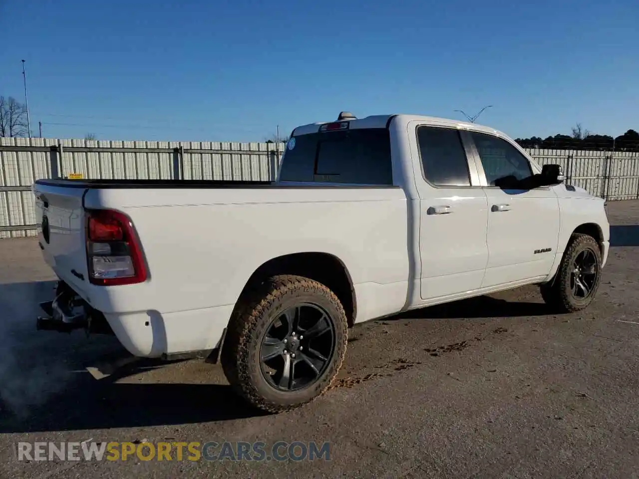 3 Photograph of a damaged car 1C6SRFBT8NN180323 RAM 1500 2022