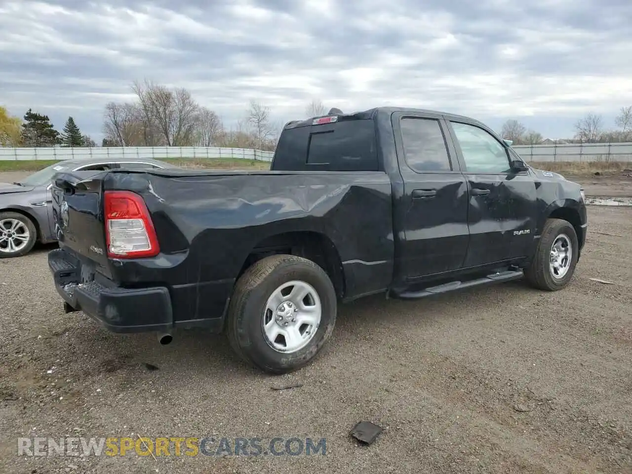 3 Photograph of a damaged car 1C6SRFCTXNN282558 RAM 1500 2022