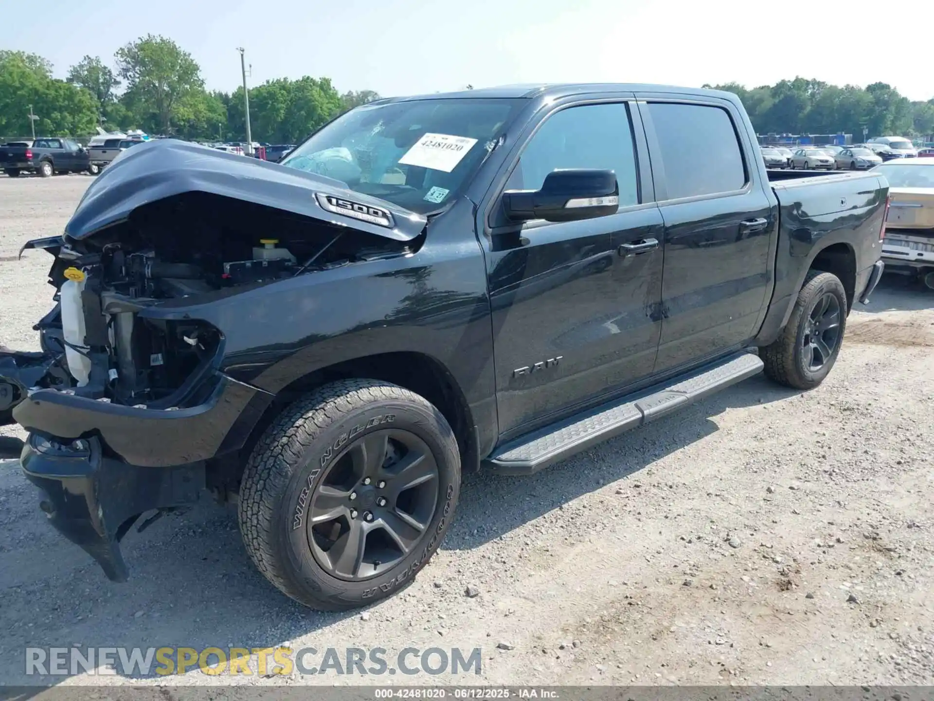 2 Photograph of a damaged car 1C6SRFFT0NN119106 RAM 1500 2022