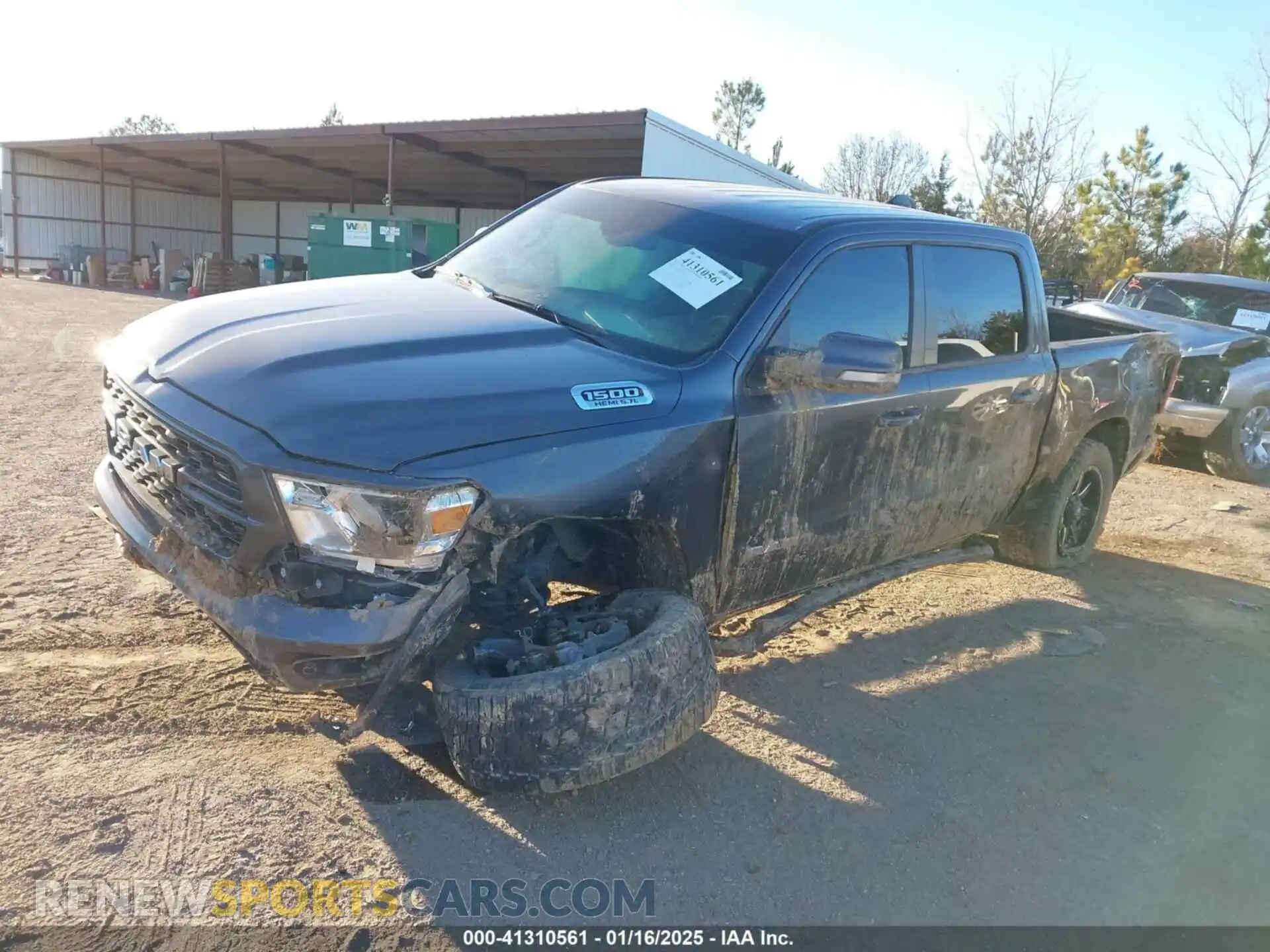 2 Photograph of a damaged car 1C6SRFFT0NN145673 RAM 1500 2022