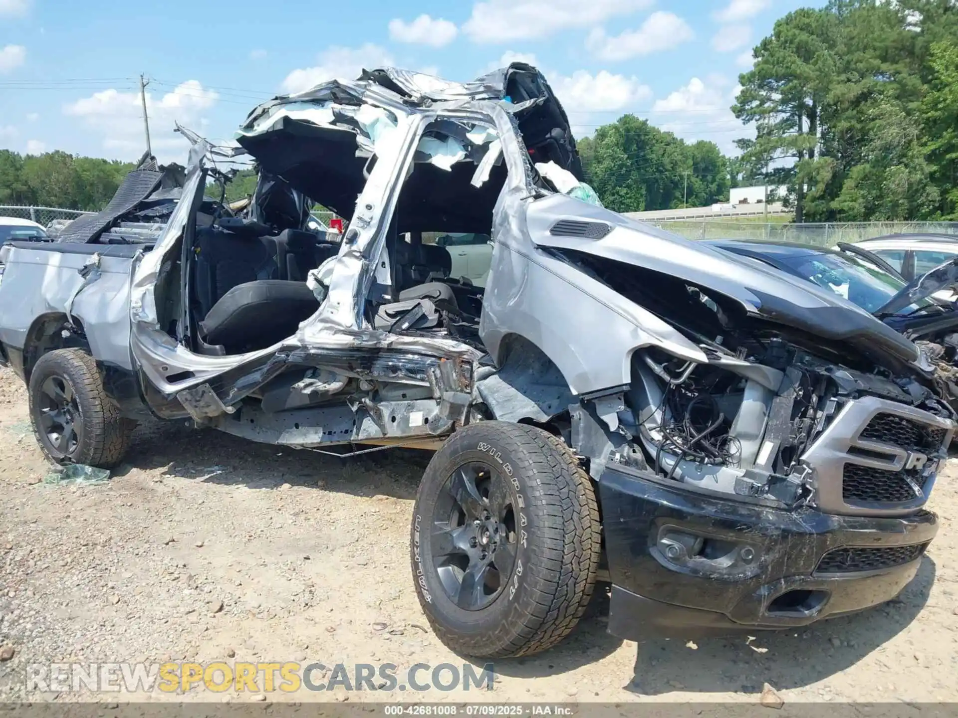 1 Photograph of a damaged car 1C6SRFFT0NN148427 RAM 1500 2022