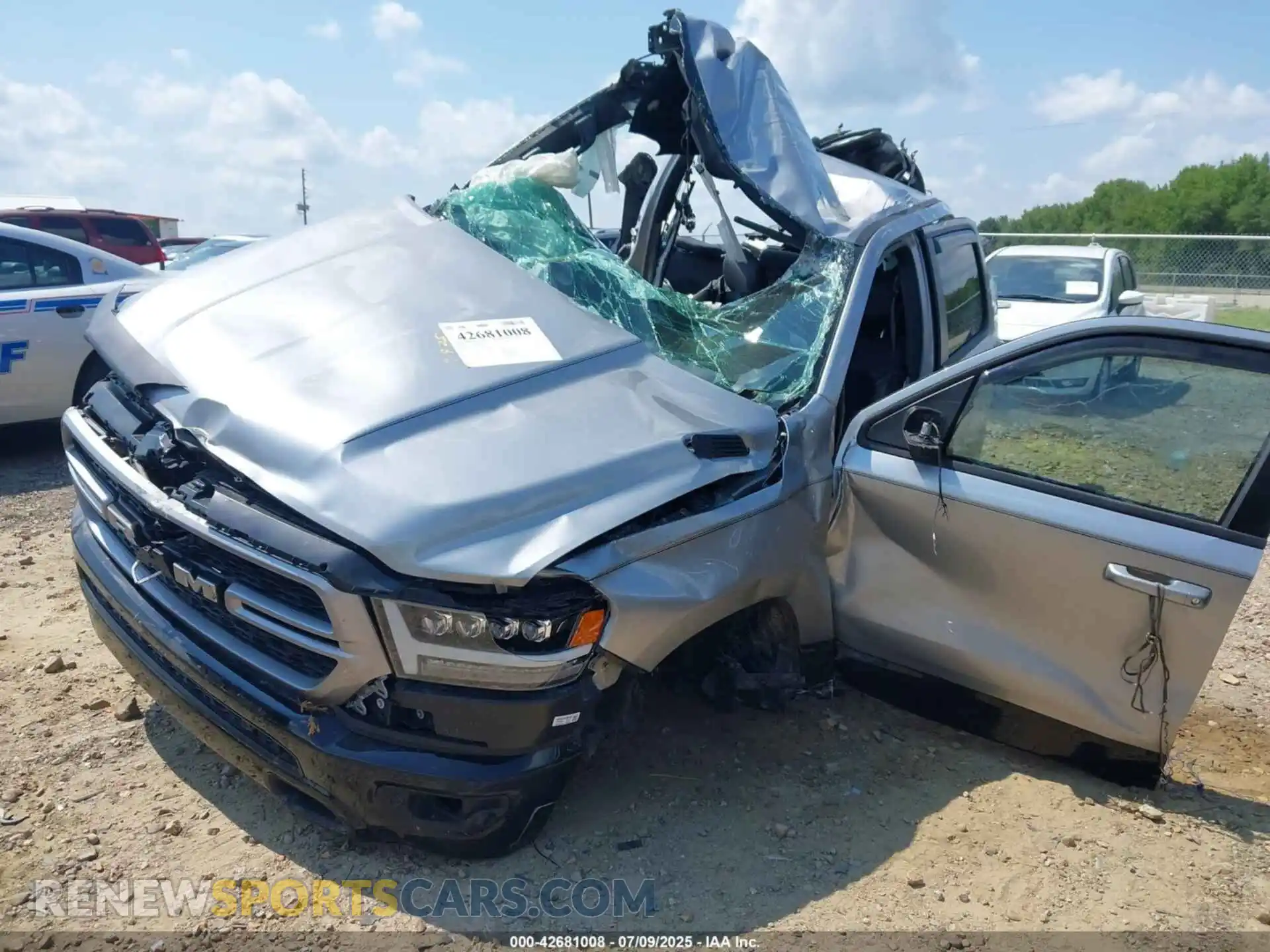 2 Photograph of a damaged car 1C6SRFFT0NN148427 RAM 1500 2022