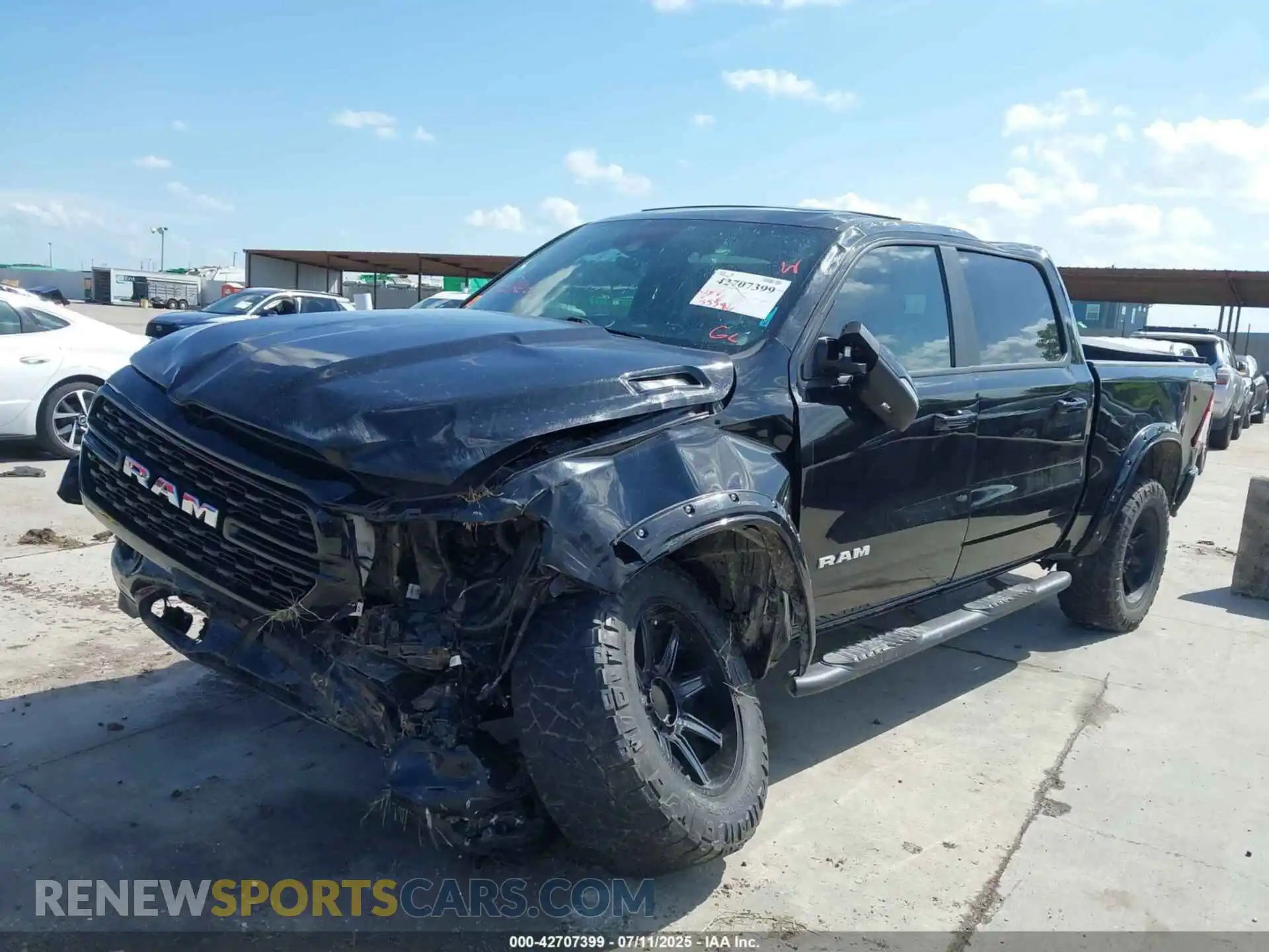 2 fotografías del automóvil dañado 1C6SRFFT0NN424234 RAM 1500 2022