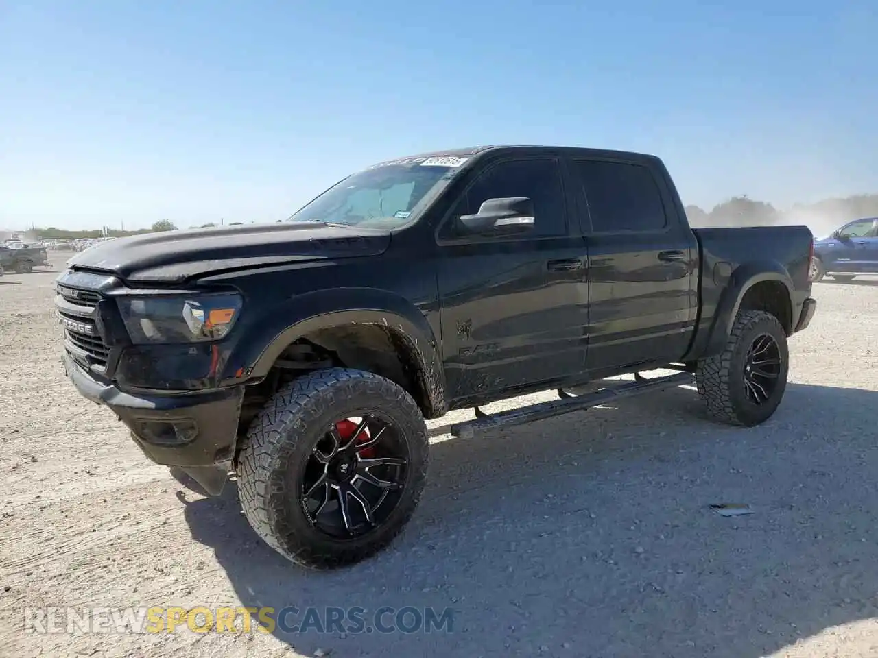 1 Photograph of a damaged car 1C6SRFFT1NN285215 RAM 1500 2022