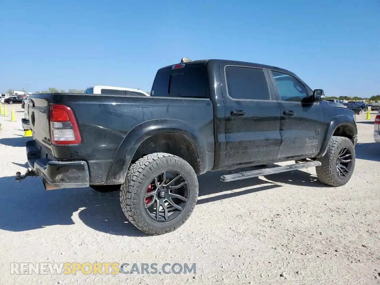 3 Photograph of a damaged car 1C6SRFFT1NN285215 RAM 1500 2022