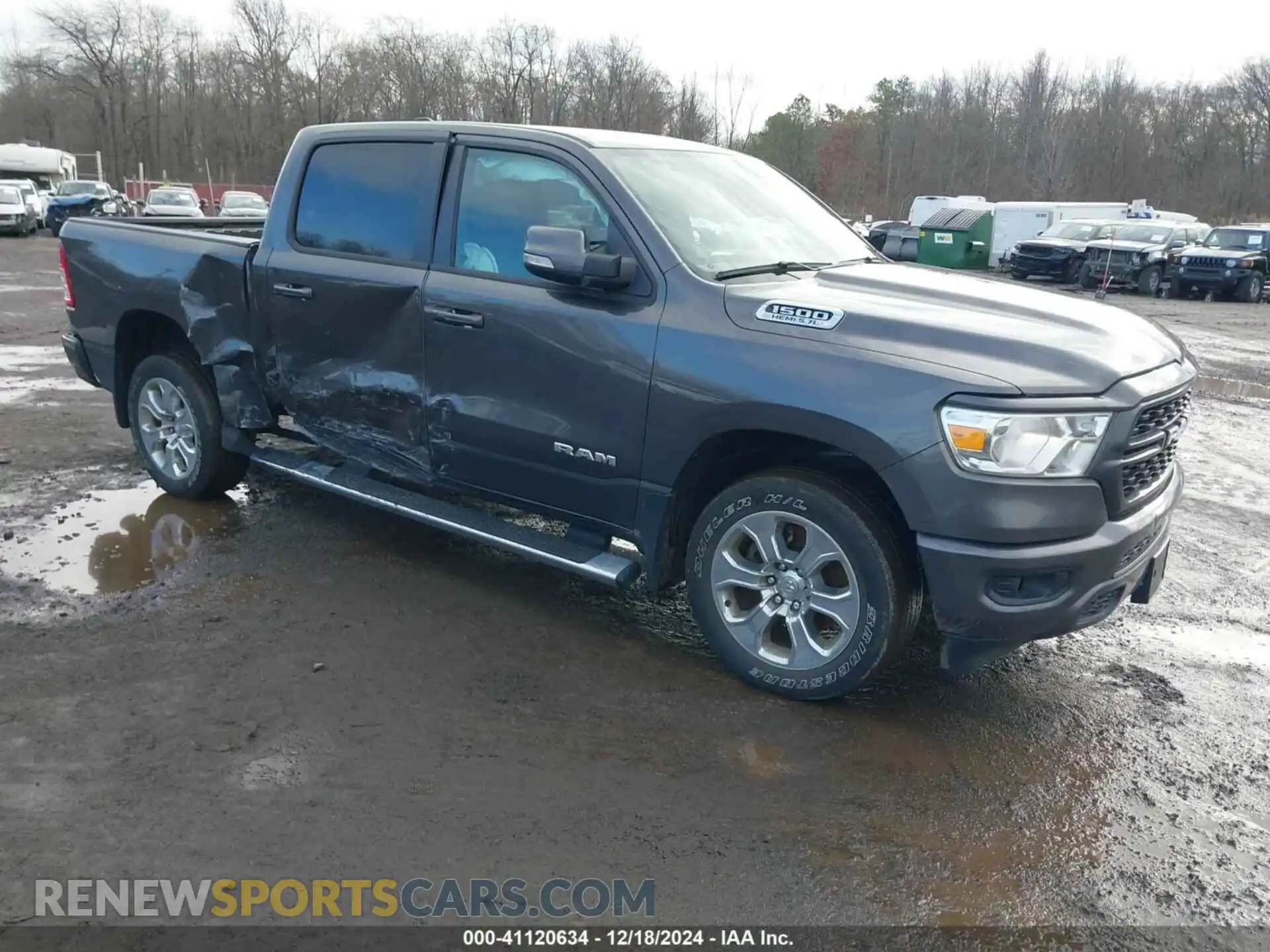 1 Photograph of a damaged car 1C6SRFFT2NN203282 RAM 1500 2022