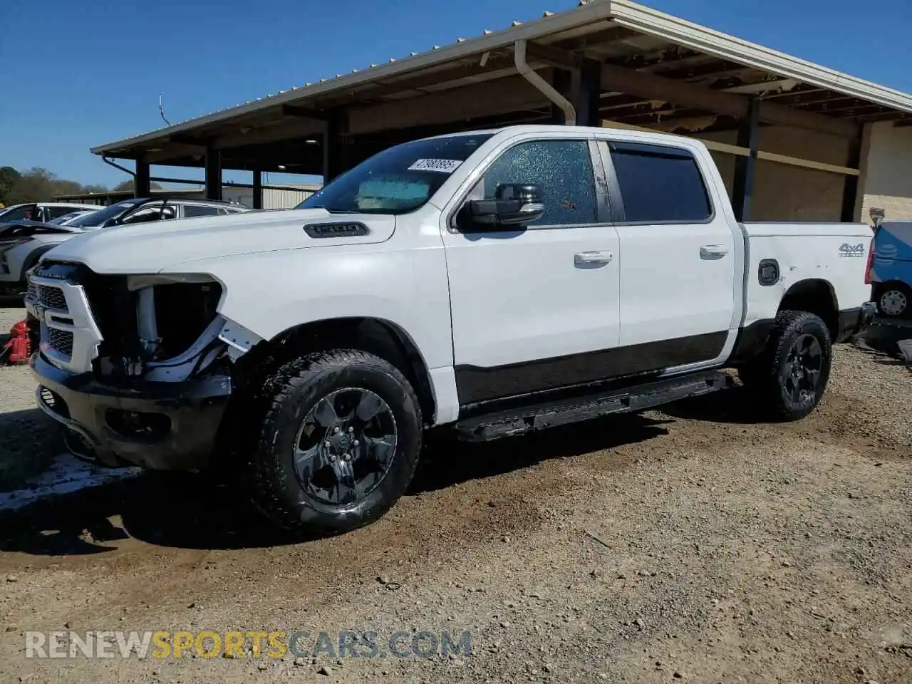 1 Photograph of a damaged car 1C6SRFFT2NN302930 RAM 1500 2022