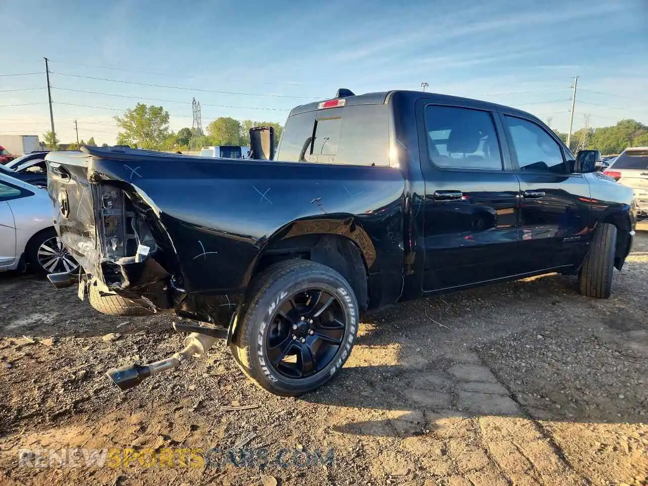 3 Photograph of a damaged car 1C6SRFFT2NN323955 RAM 1500 2022