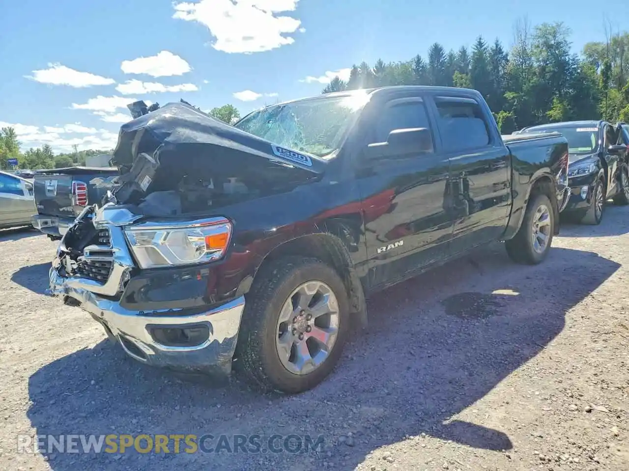 1 Photograph of a damaged car 1C6SRFFT2NN376087 RAM 1500 2022