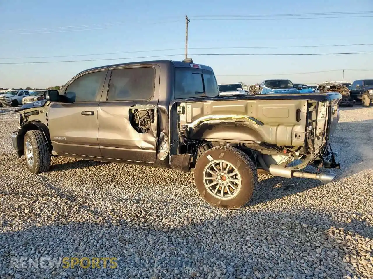 2 Photograph of a damaged car 1C6SRFFT2NN380723 RAM 1500 2022