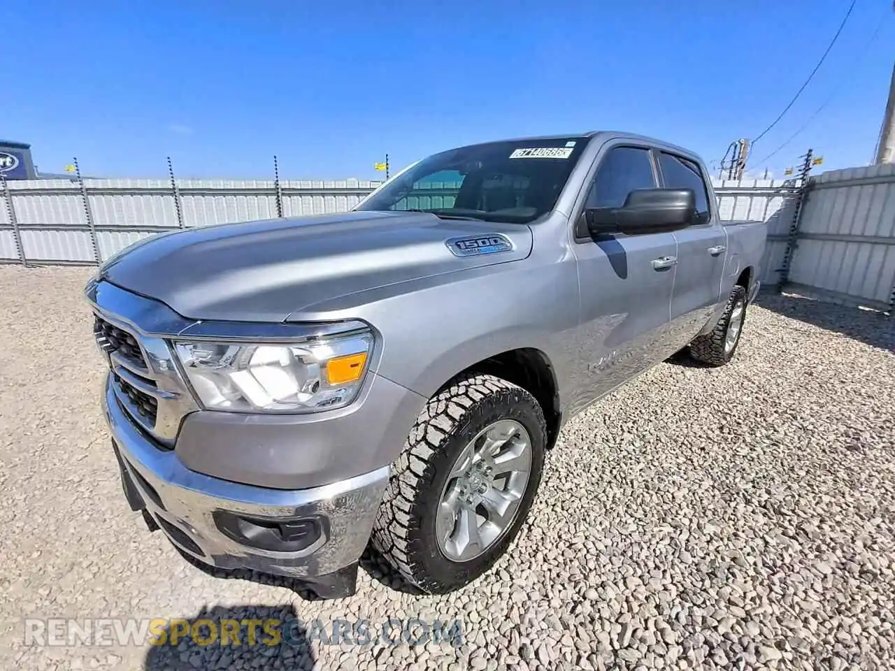 1 Photograph of a damaged car 1C6SRFFT2NN411842 RAM 1500 2022