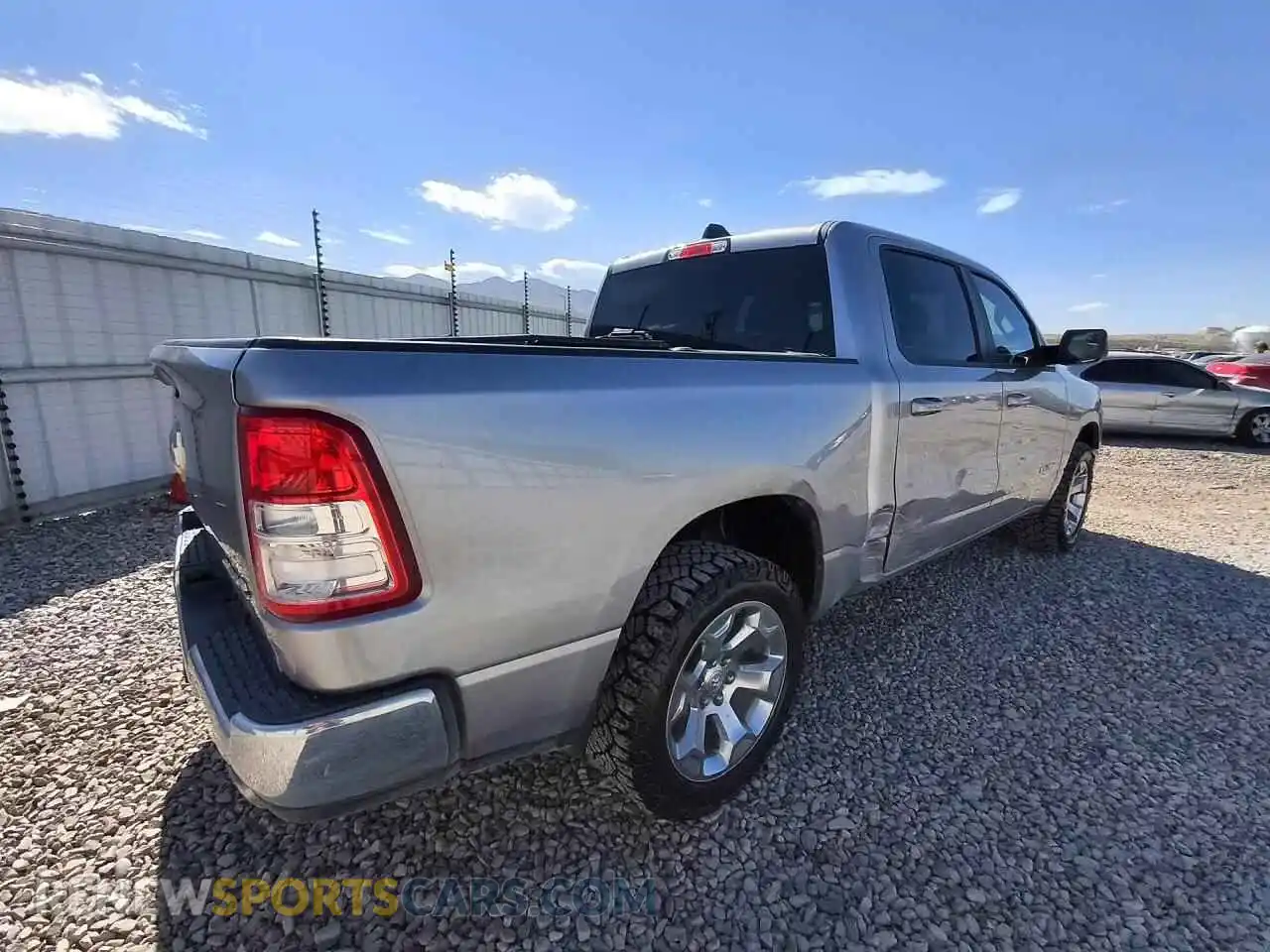 3 Photograph of a damaged car 1C6SRFFT2NN411842 RAM 1500 2022