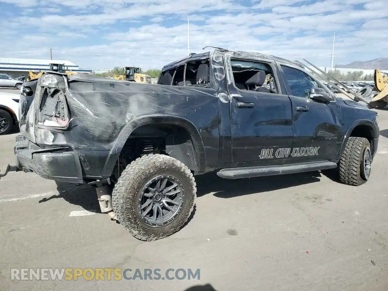 3 Photograph of a damaged car 1C6SRFFT3NN251096 RAM 1500 2022
