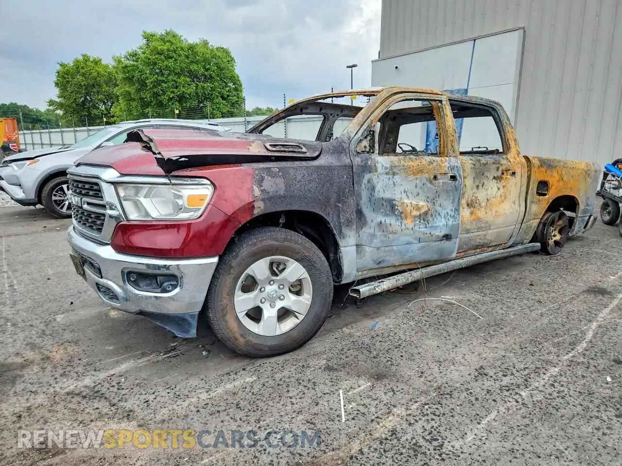 1 Photograph of a damaged car 1C6SRFFT3NN307005 RAM 1500 2022