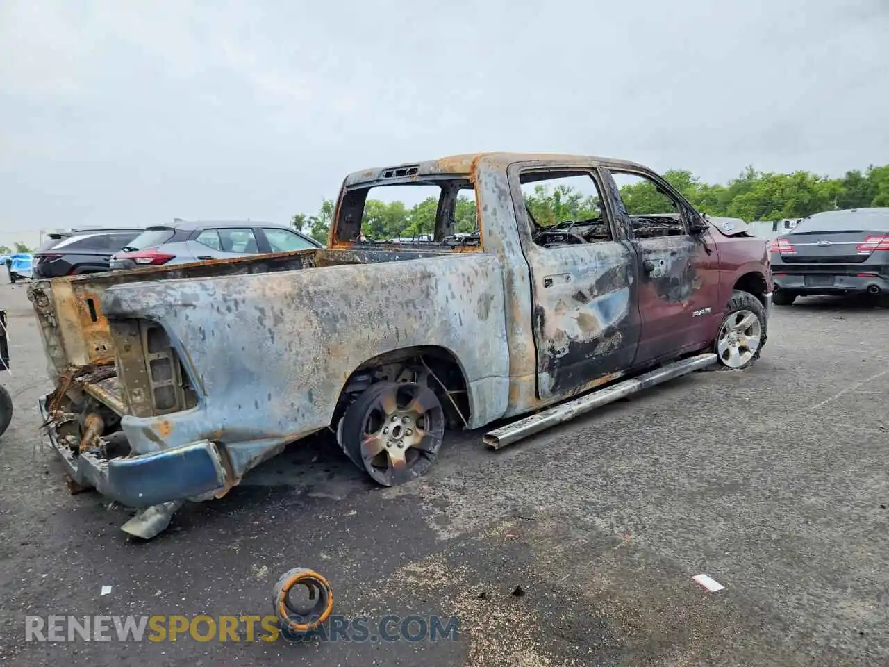 3 Photograph of a damaged car 1C6SRFFT3NN307005 RAM 1500 2022