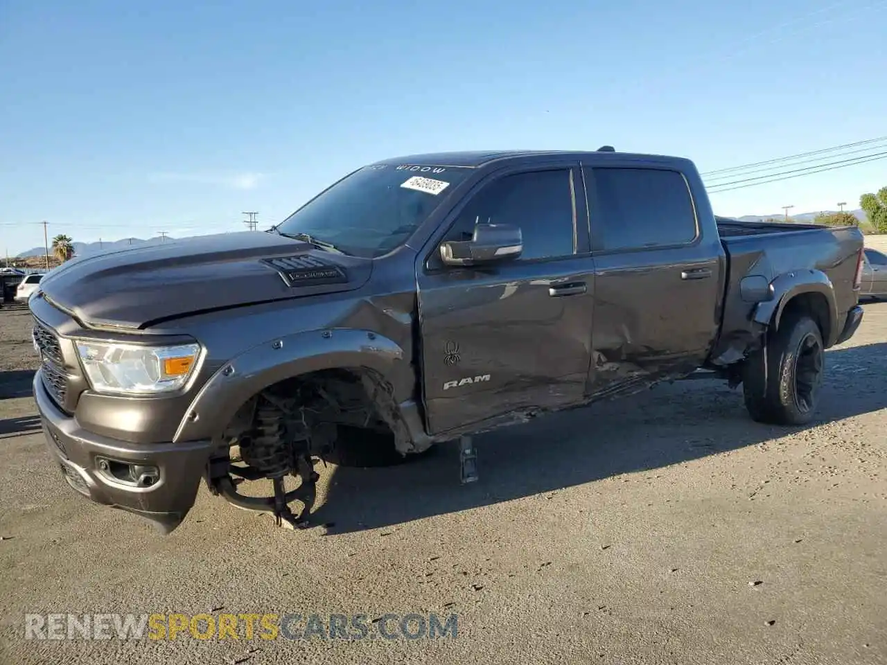 1 Photograph of a damaged car 1C6SRFFT3NN311295 RAM 1500 2022