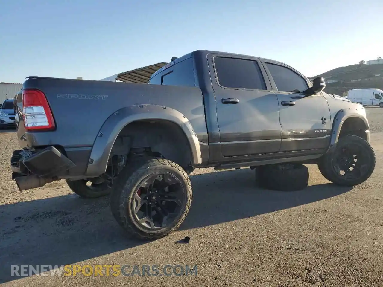 3 Photograph of a damaged car 1C6SRFFT3NN311295 RAM 1500 2022