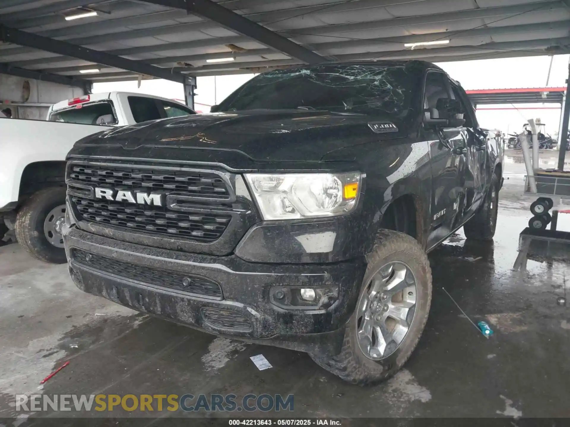 2 Photograph of a damaged car 1C6SRFFT3NN406309 RAM 1500 2022