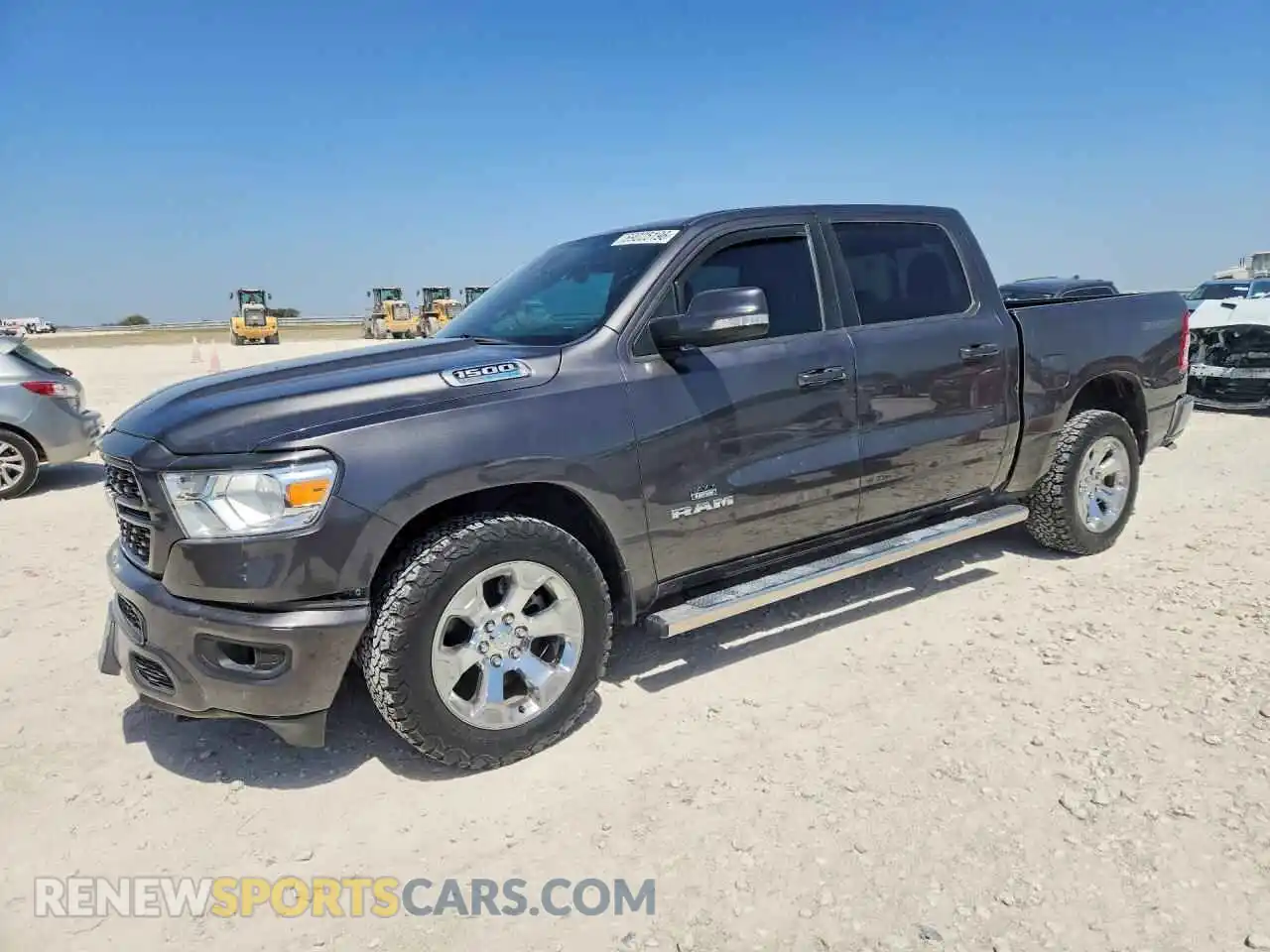 1 Photograph of a damaged car 1C6SRFFT3NN412191 RAM 1500 2022