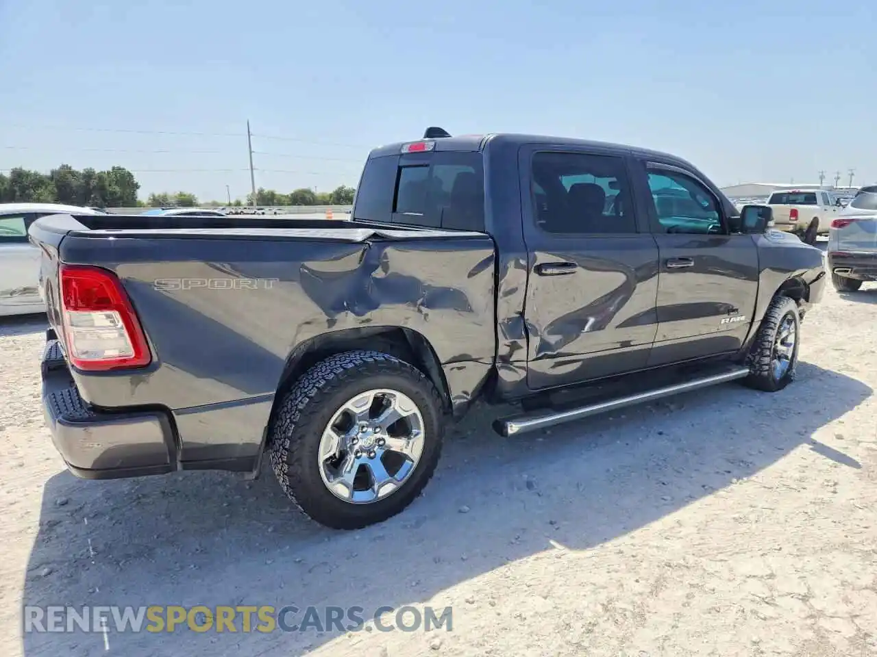 3 Photograph of a damaged car 1C6SRFFT3NN412191 RAM 1500 2022