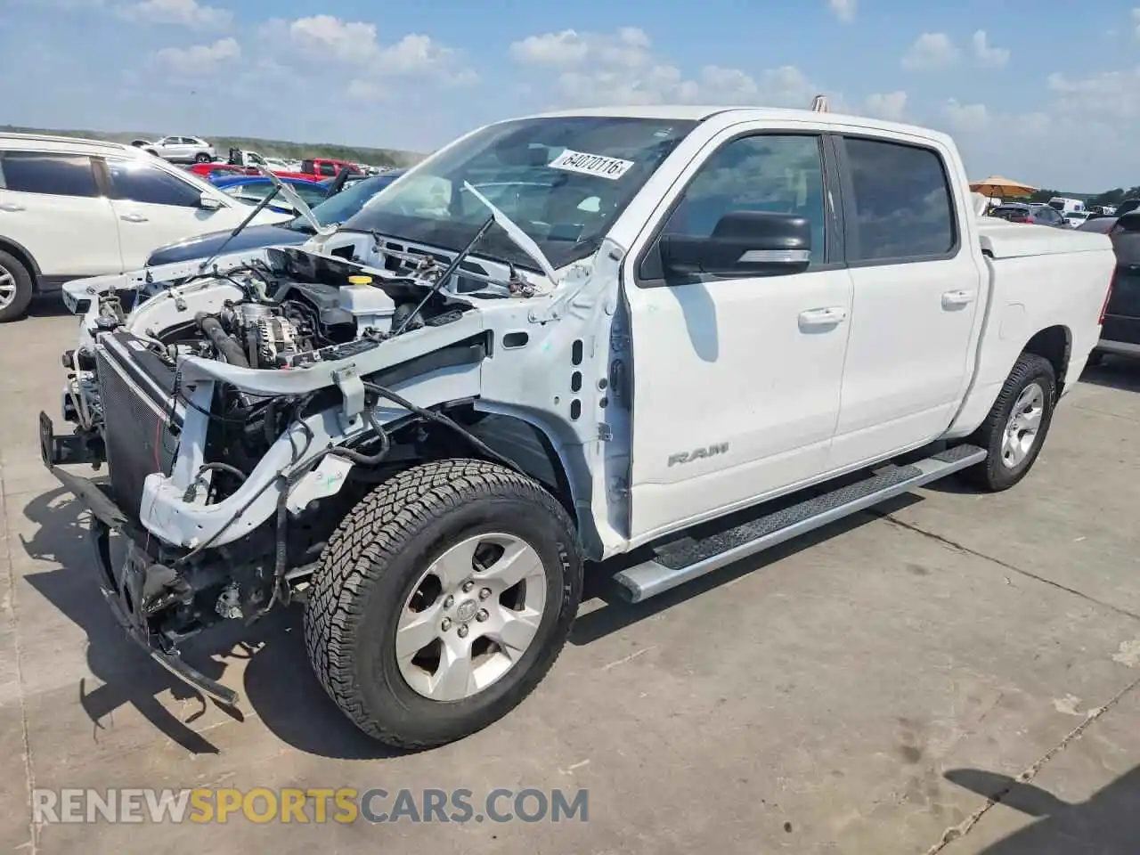 1 Photograph of a damaged car 1C6SRFFT4NN299223 RAM 1500 2022