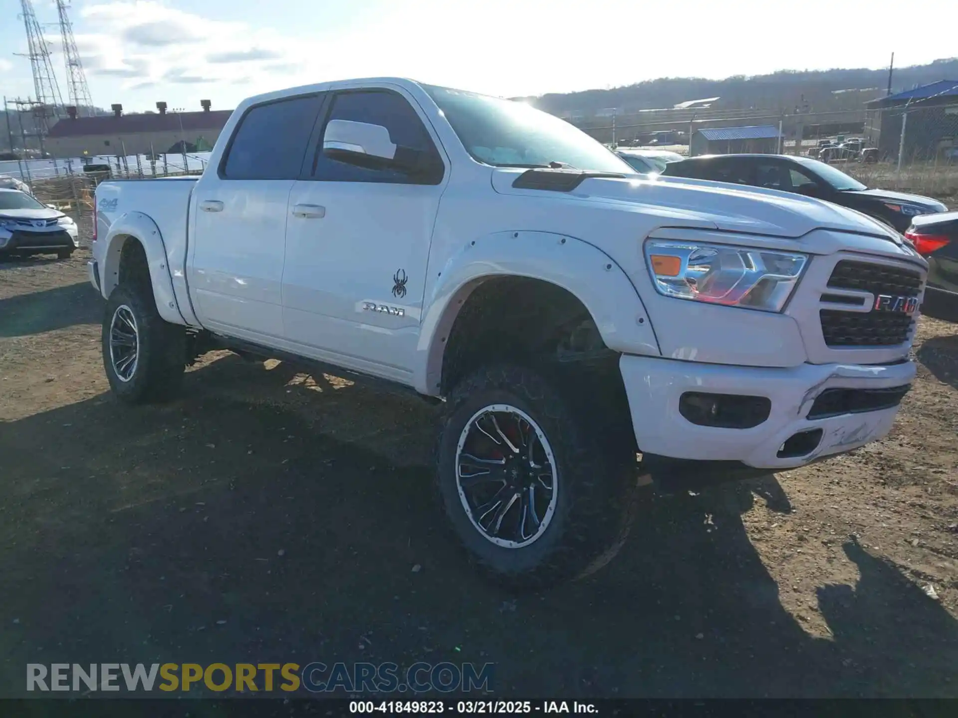 1 Photograph of a damaged car 1C6SRFFT4NN428657 RAM 1500 2022