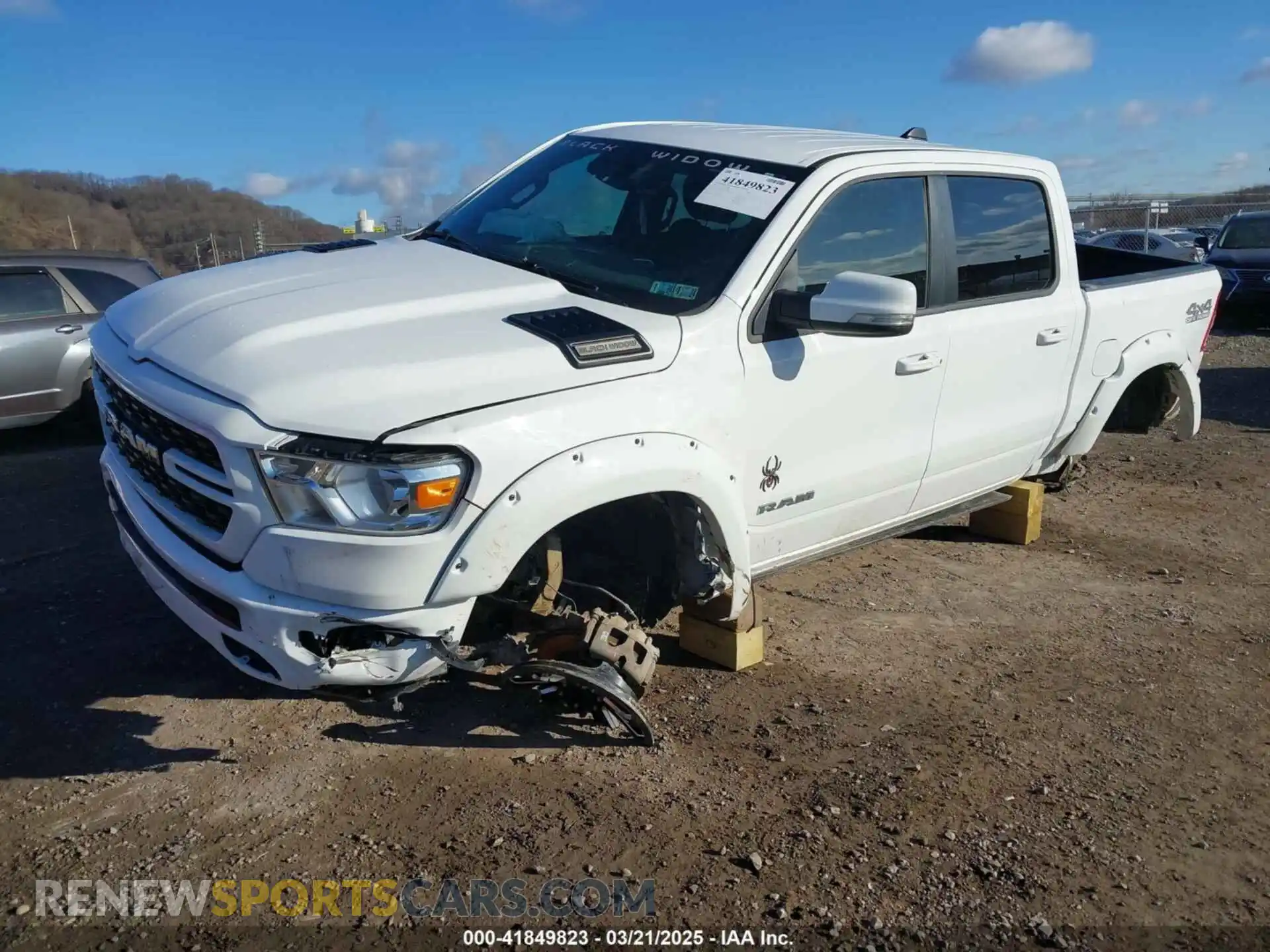 2 Photograph of a damaged car 1C6SRFFT4NN428657 RAM 1500 2022