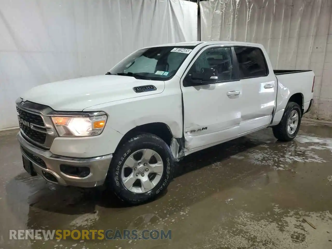 1 Photograph of a damaged car 1C6SRFFT4NN464946 RAM 1500 2022