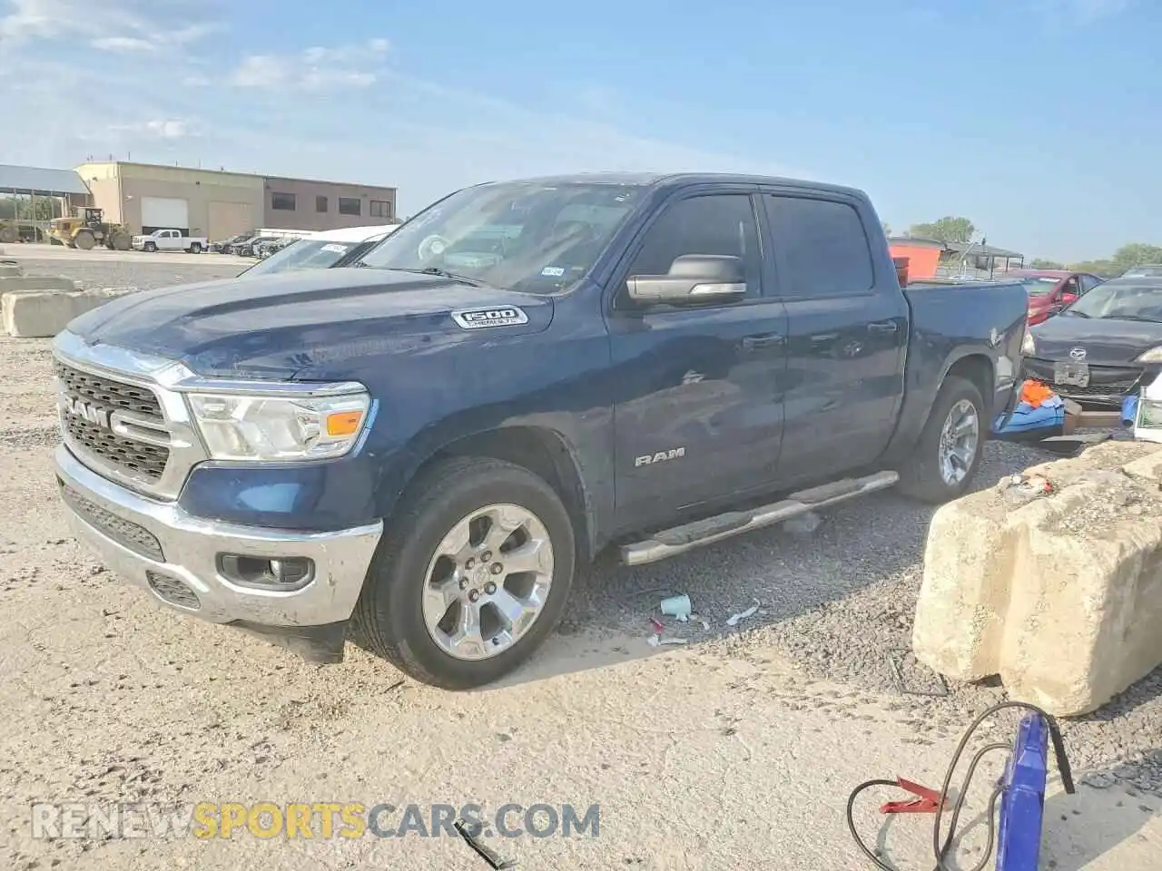 1 Photograph of a damaged car 1C6SRFFT5NN129095 RAM 1500 2022