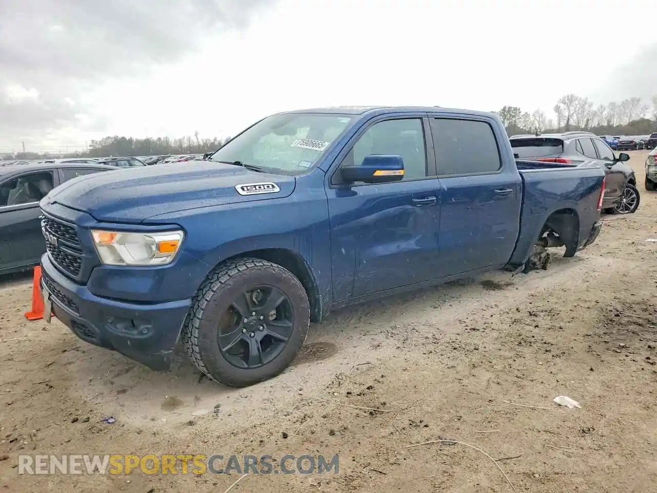 1 Photograph of a damaged car 1C6SRFFT5NN406313 RAM 1500 2022