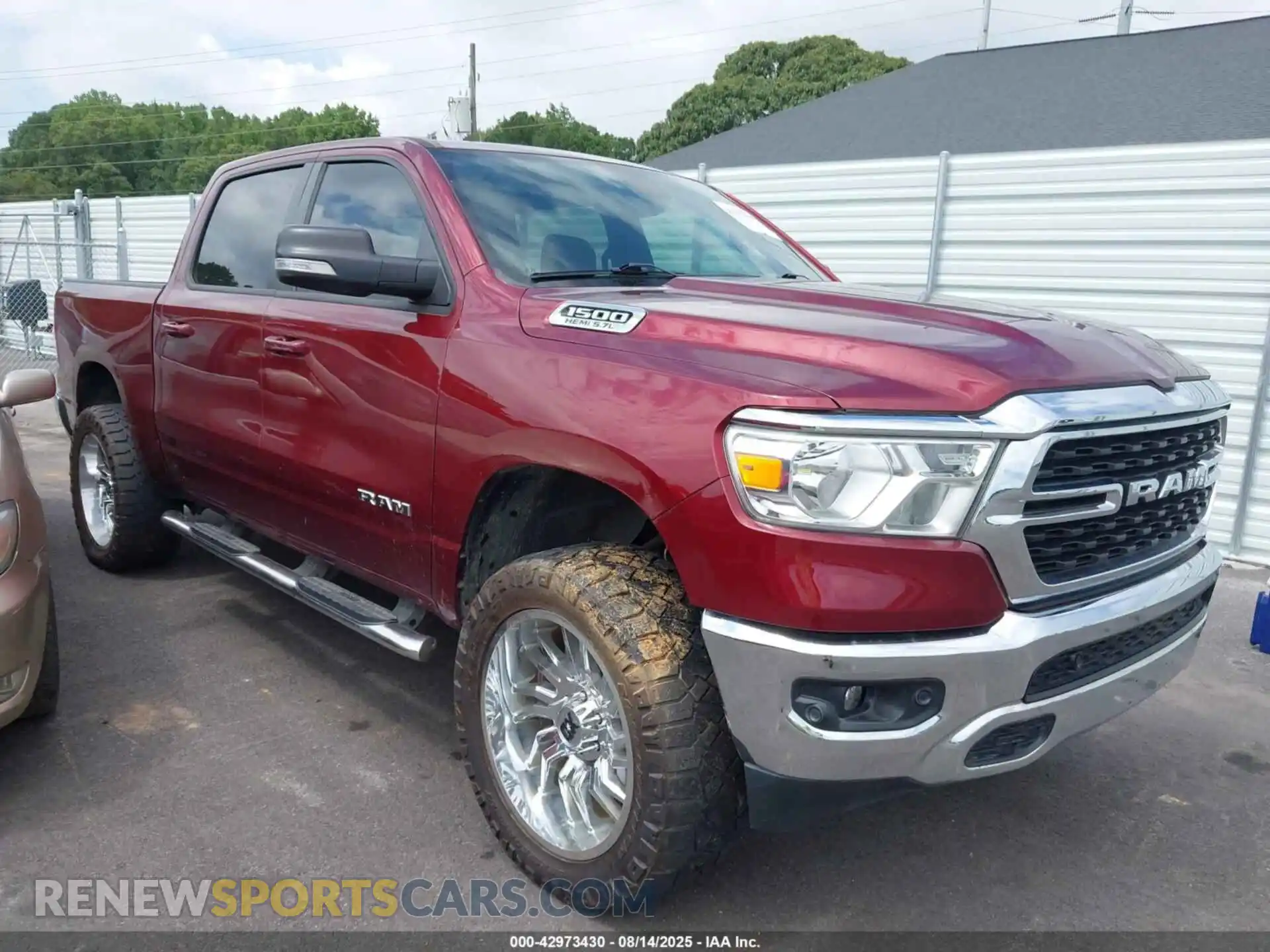 1 Photograph of a damaged car 1C6SRFFT6NN221669 RAM 1500 2022