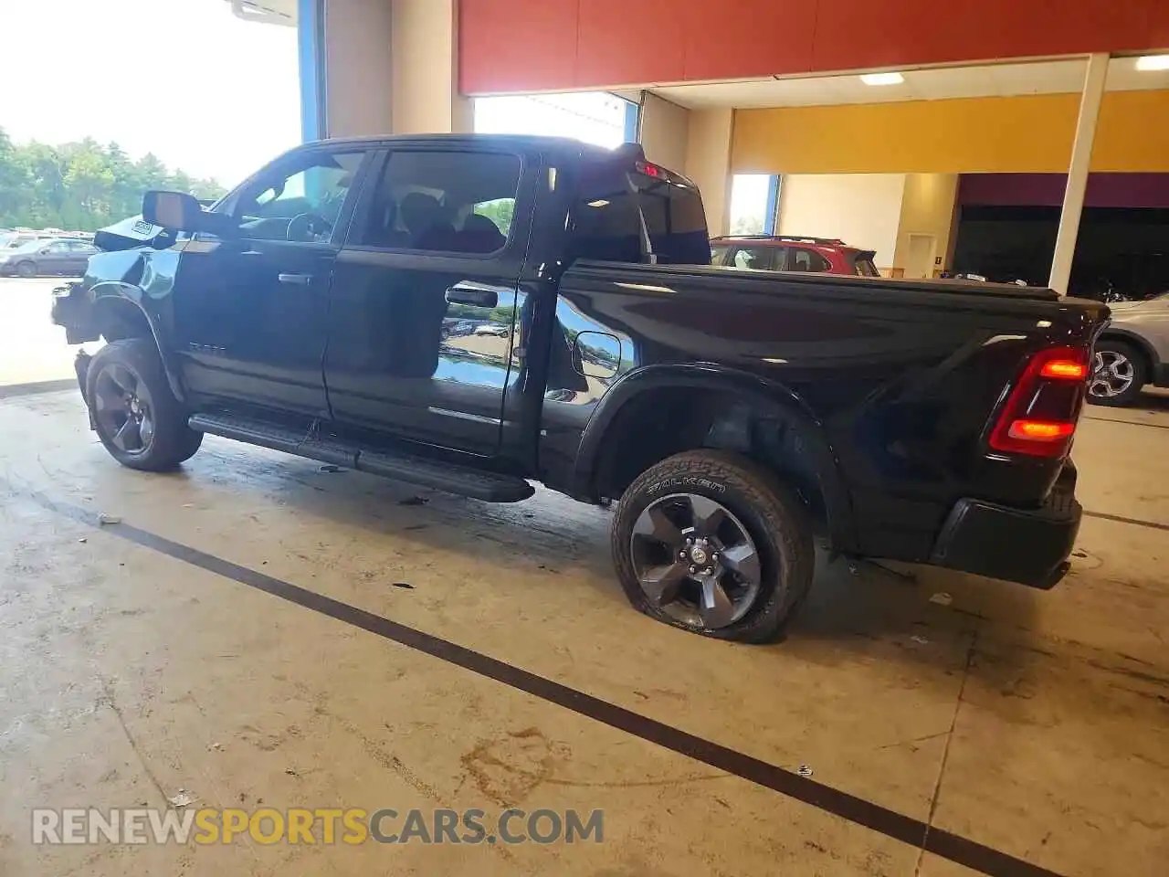 2 Photograph of a damaged car 1C6SRFFT6NN245180 RAM 1500 2022