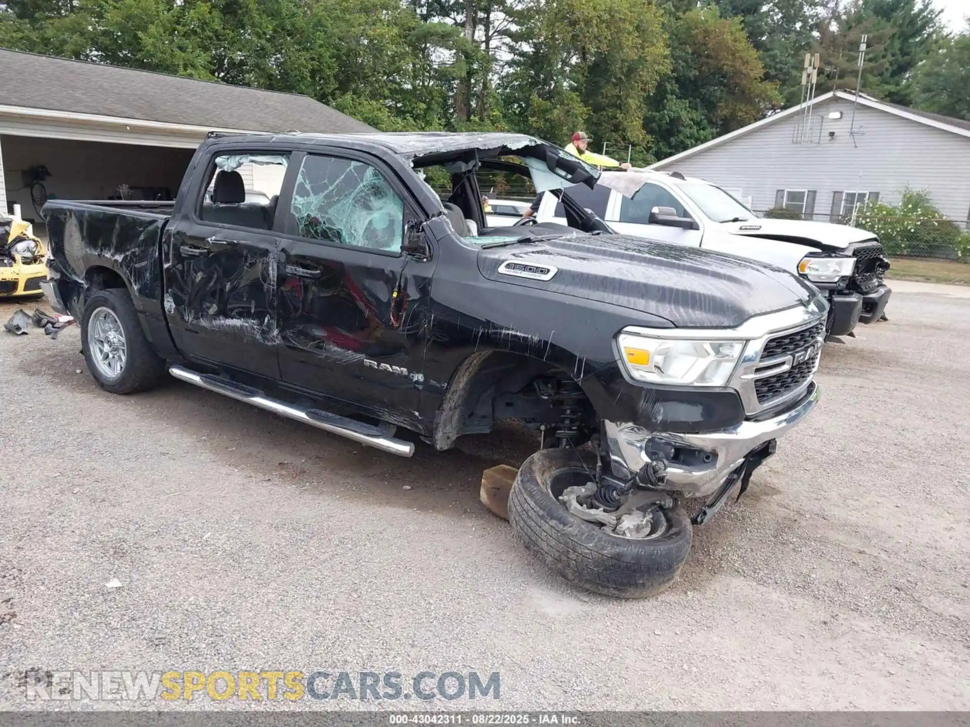 1 Photograph of a damaged car 1C6SRFFT7NN148182 RAM 1500 2022
