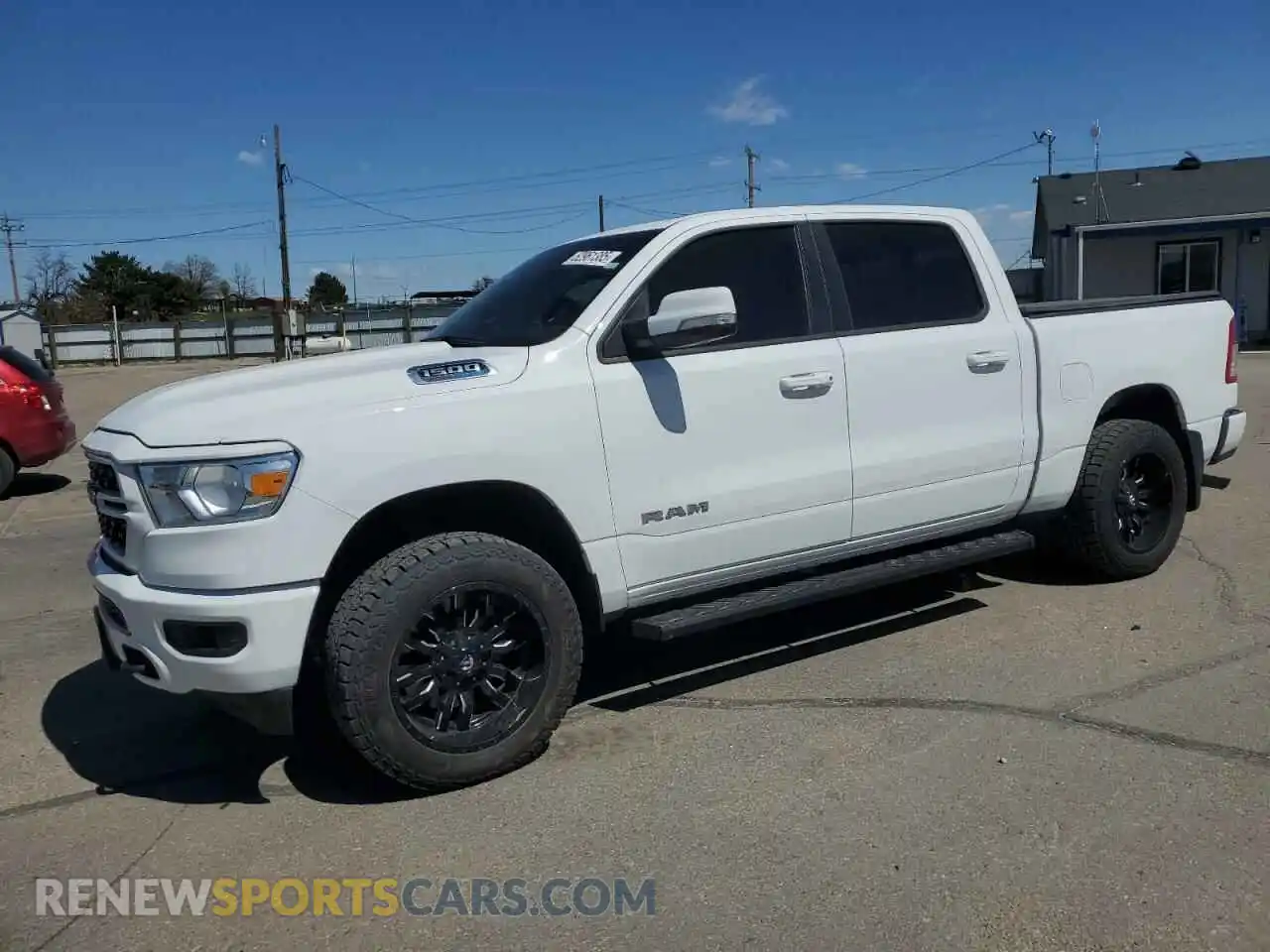 1 Photograph of a damaged car 1C6SRFFT7NN429379 RAM 1500 2022