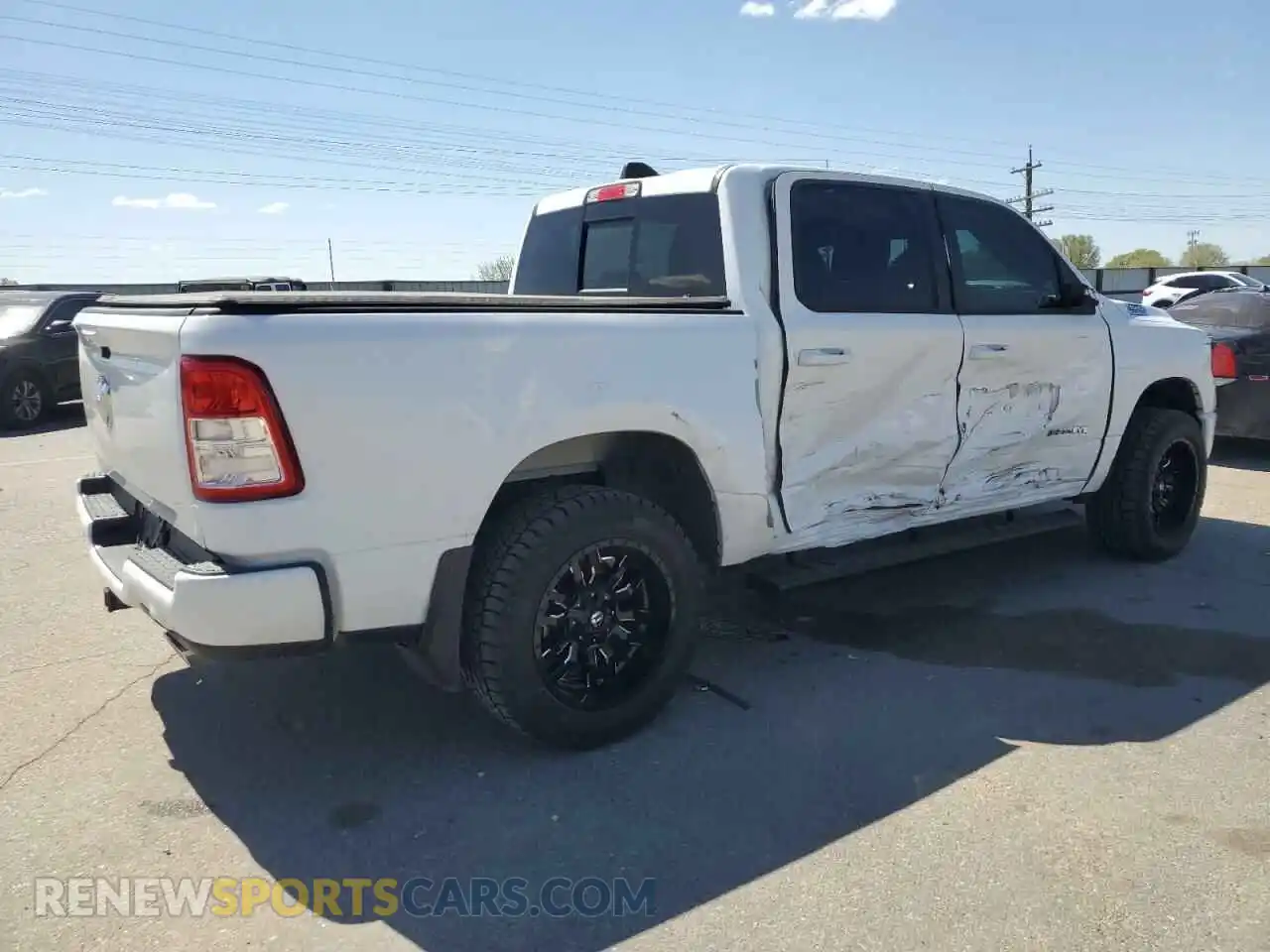 3 Photograph of a damaged car 1C6SRFFT7NN429379 RAM 1500 2022
