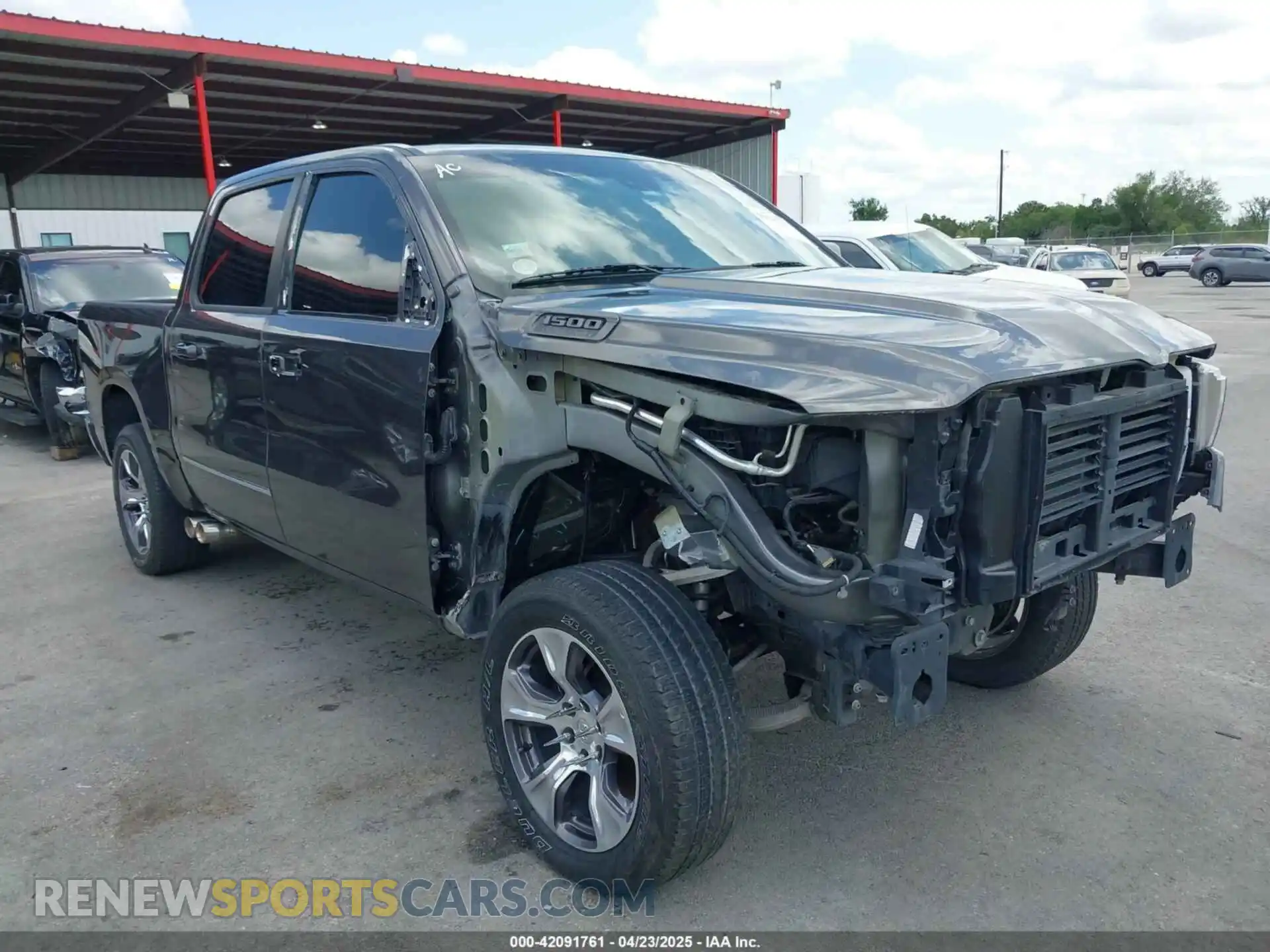 1 Photograph of a damaged car 1C6SRFFT8NN137742 RAM 1500 2022