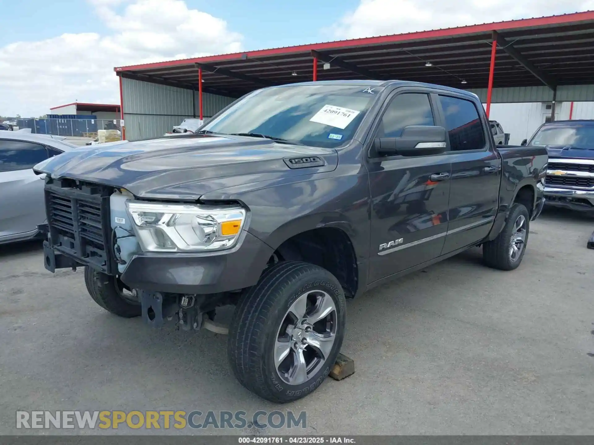 2 Photograph of a damaged car 1C6SRFFT8NN137742 RAM 1500 2022