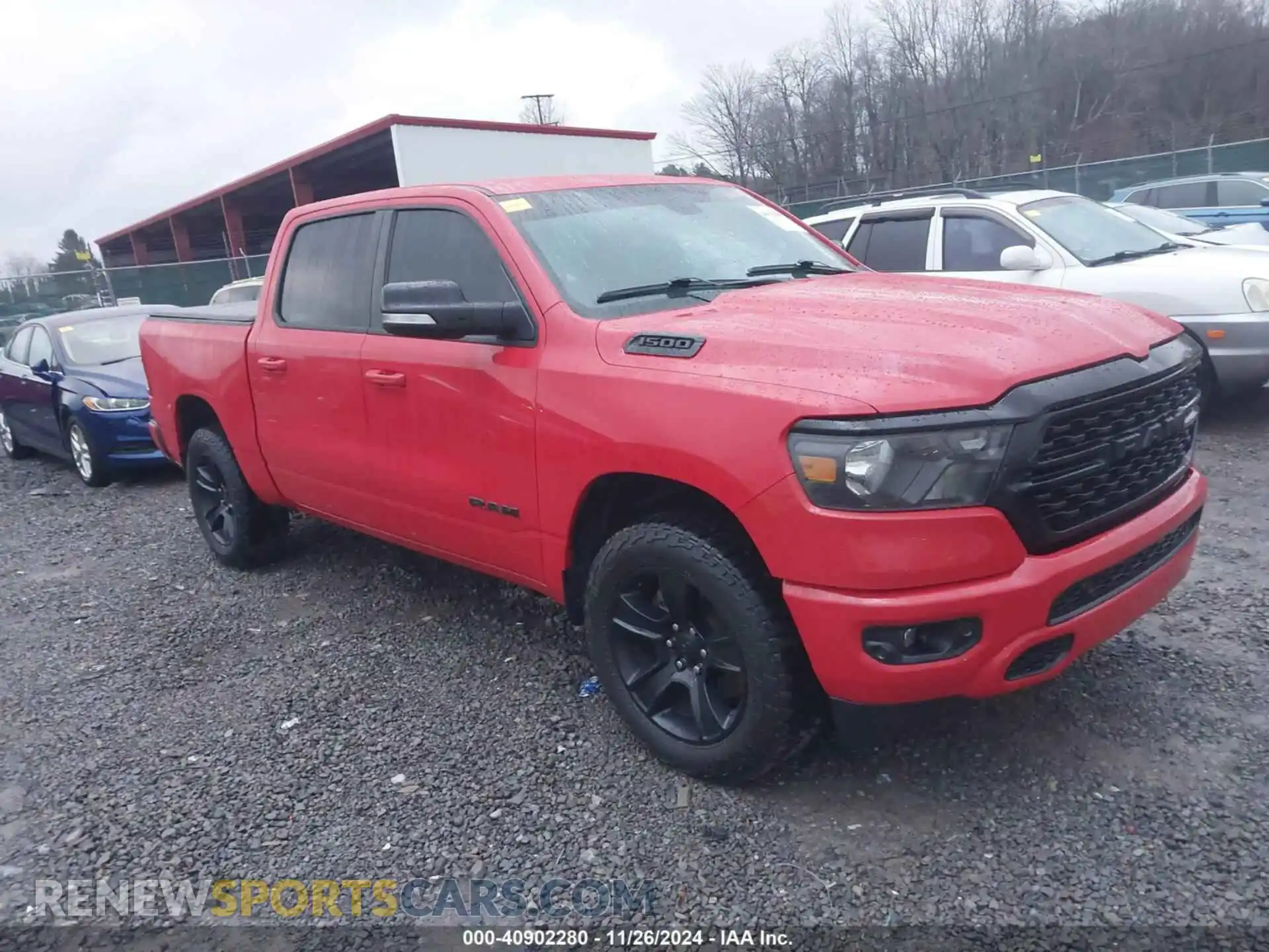 1 Photograph of a damaged car 1C6SRFFT8NN221060 RAM 1500 2022