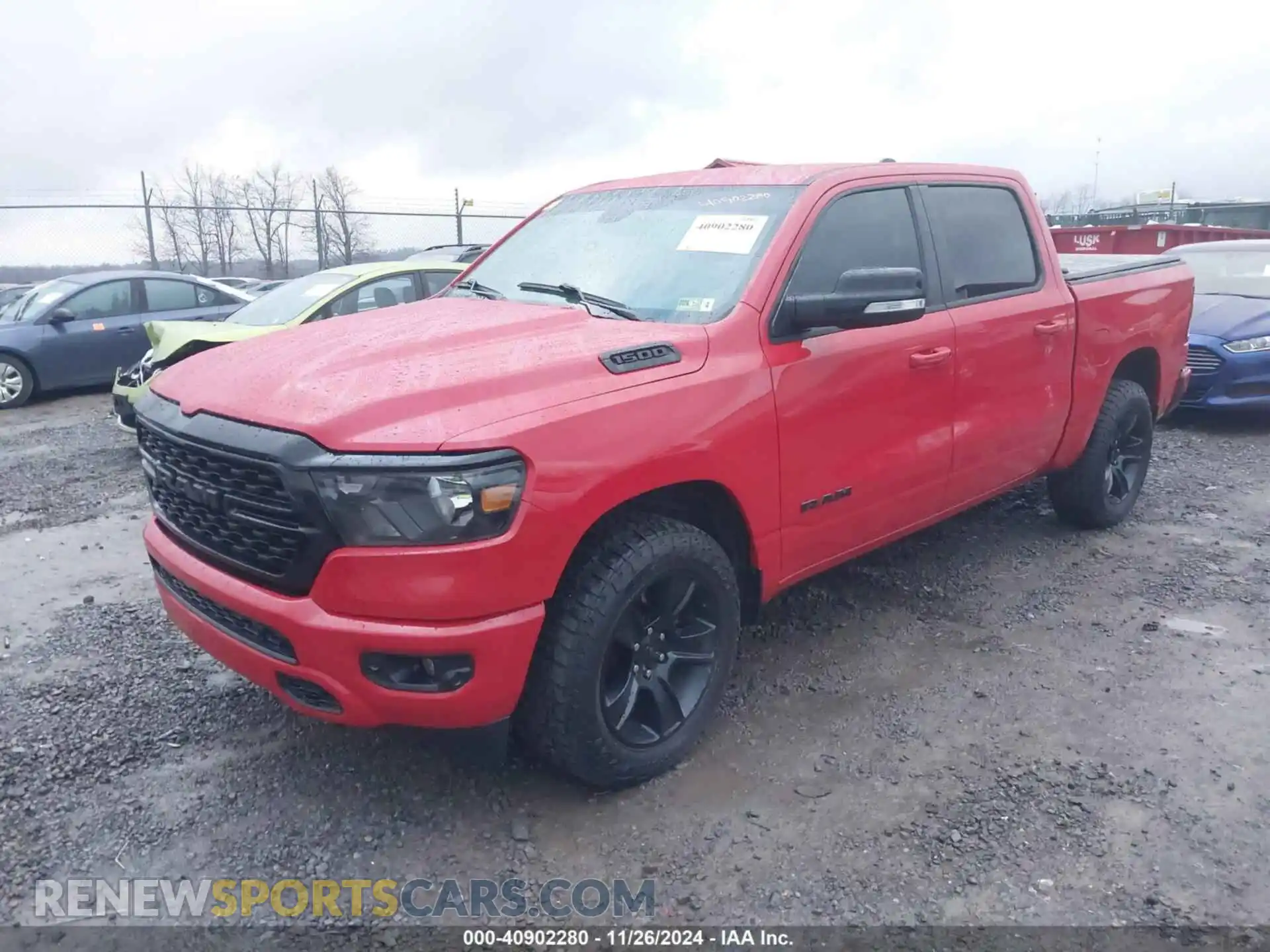 2 Photograph of a damaged car 1C6SRFFT8NN221060 RAM 1500 2022