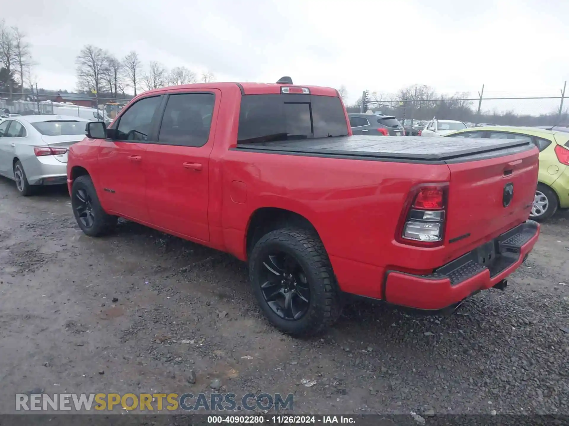 3 Photograph of a damaged car 1C6SRFFT8NN221060 RAM 1500 2022