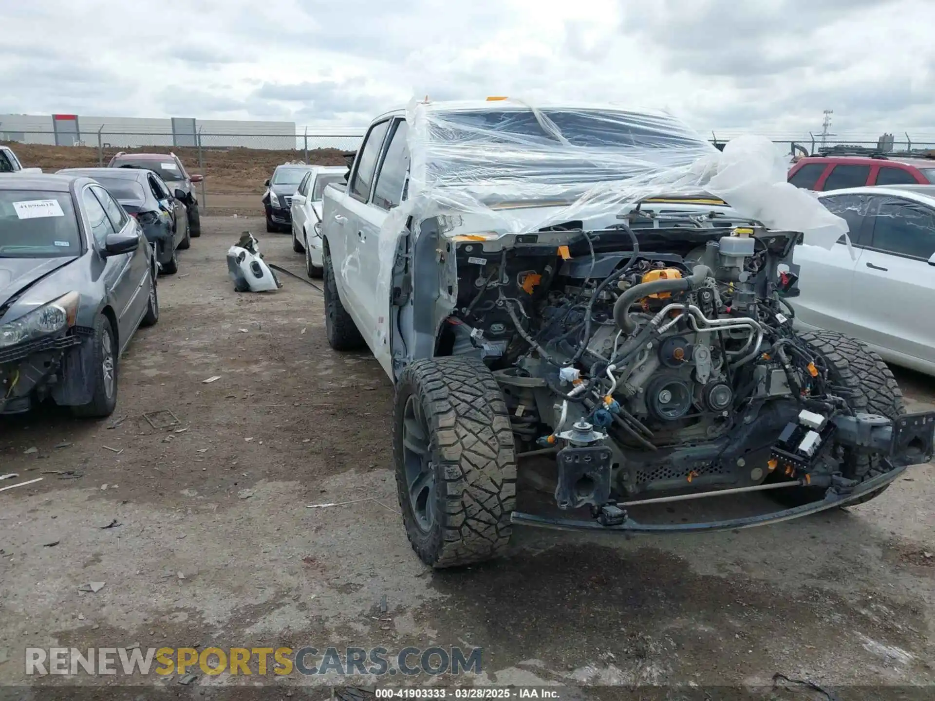 1 Photograph of a damaged car 1C6SRFFT8NN234780 RAM 1500 2022