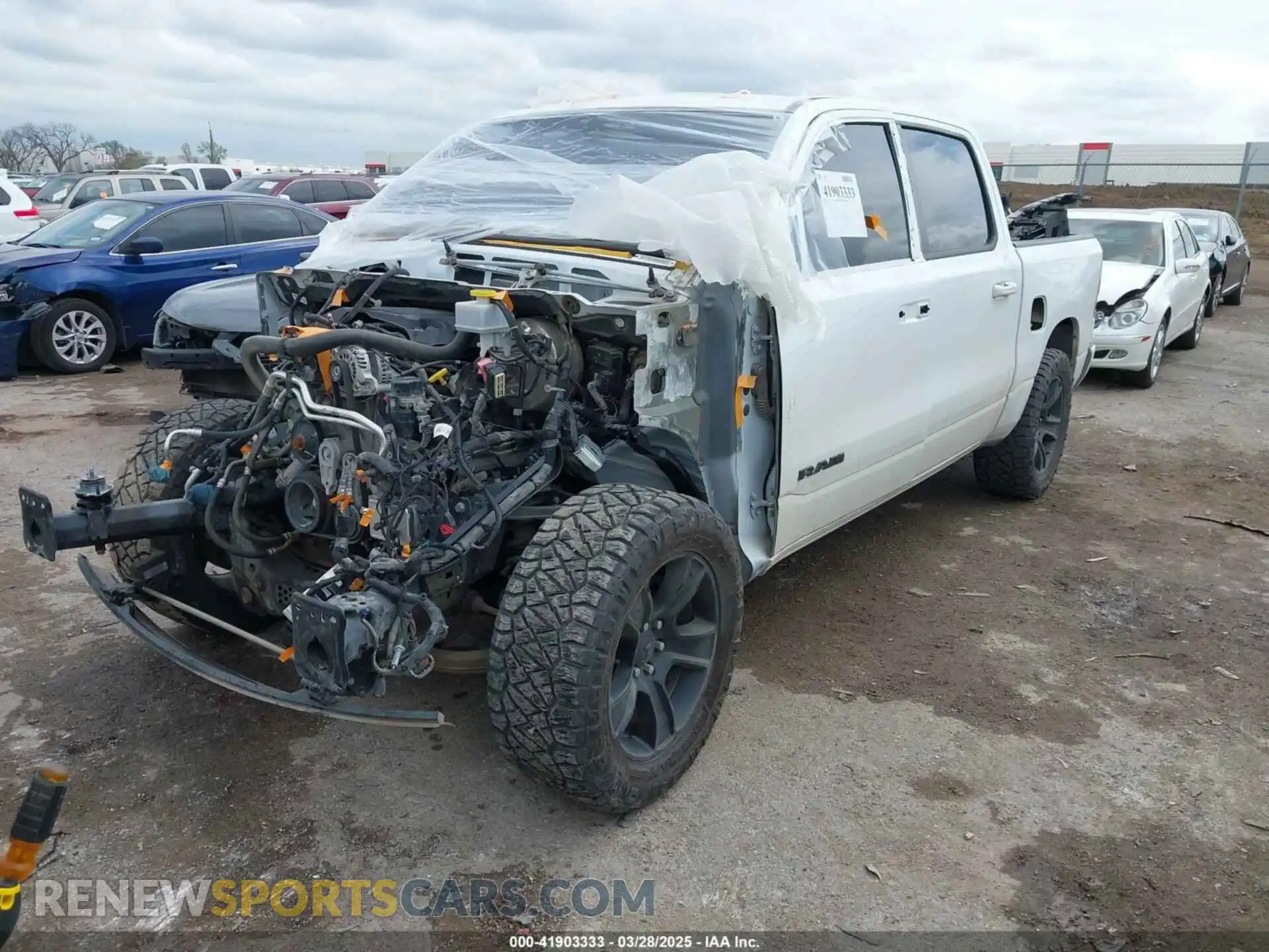 2 Photograph of a damaged car 1C6SRFFT8NN234780 RAM 1500 2022