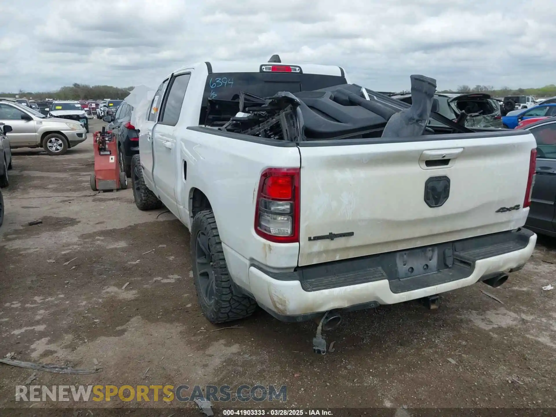3 Photograph of a damaged car 1C6SRFFT8NN234780 RAM 1500 2022