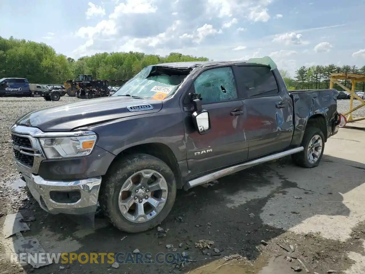 1 Photograph of a damaged car 1C6SRFFT8NN379253 RAM 1500 2022